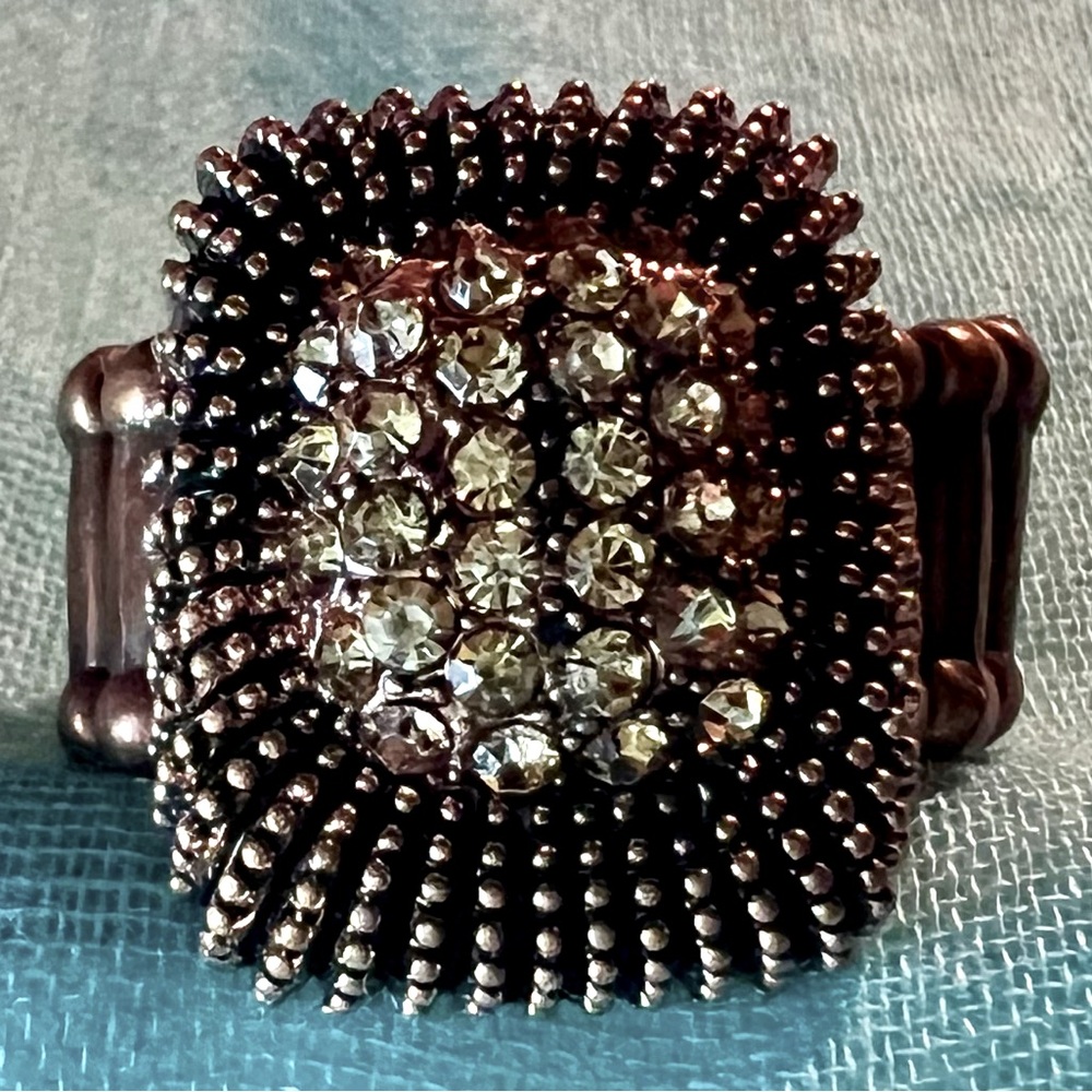 WOW. Cooper tone with lots of bling. Expandable ring